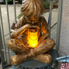 Creative  Boy Holding Light Statue